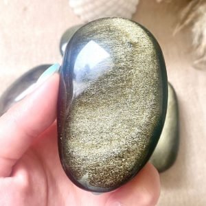 galet en obsidienne dorée. pierre naturelle d'ancrage.